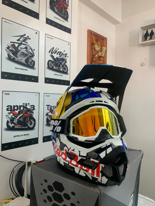 The 100% AIRCRAFT RedBull Dirt Helmet